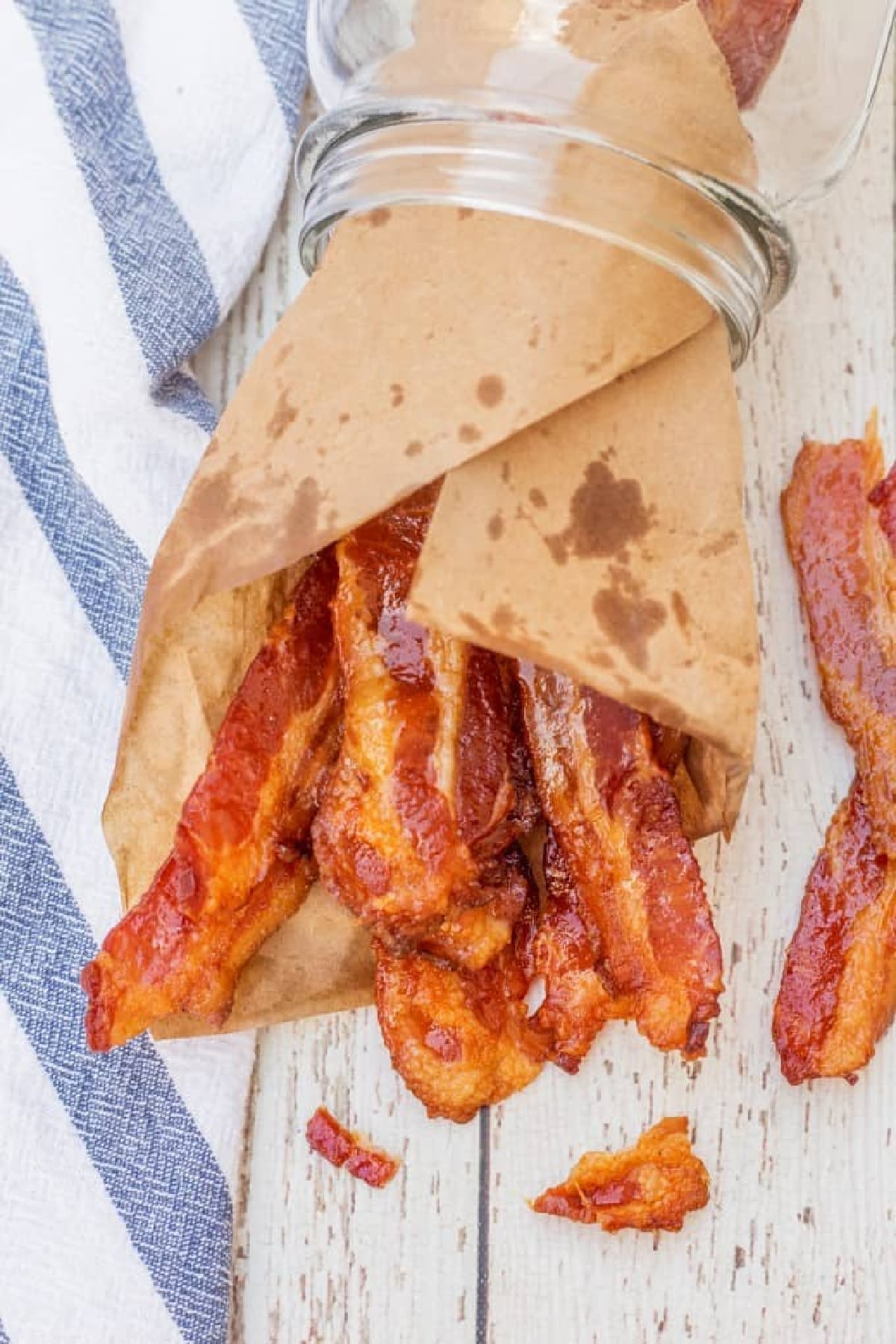 Brown sugar bacon wrapped in paper lying down and shot from overhead. 