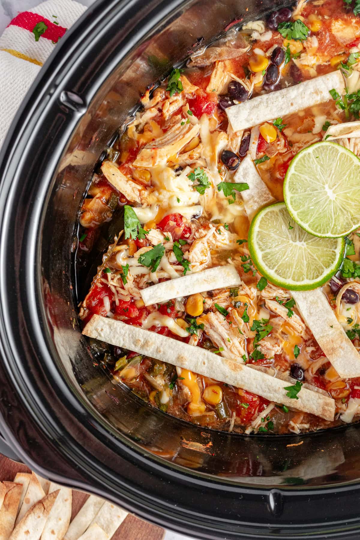 Overhead shot of crock pot tortilla soup still in the machine.